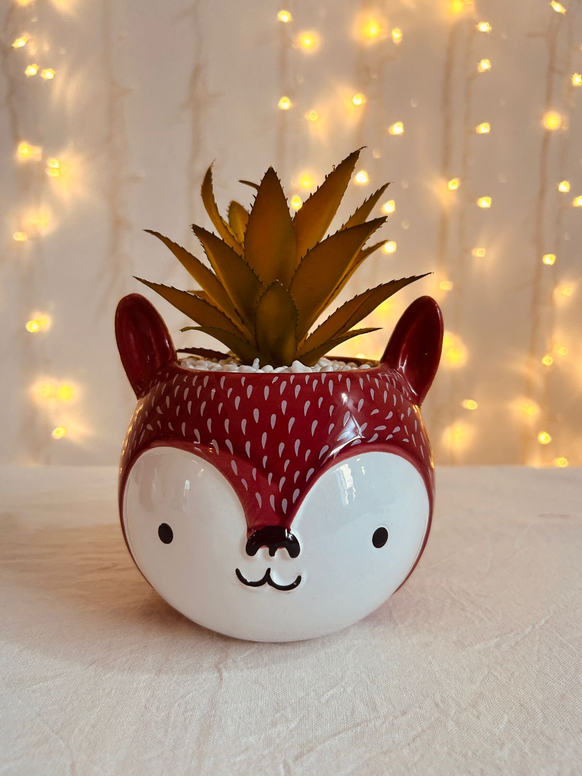 Animalito con planta