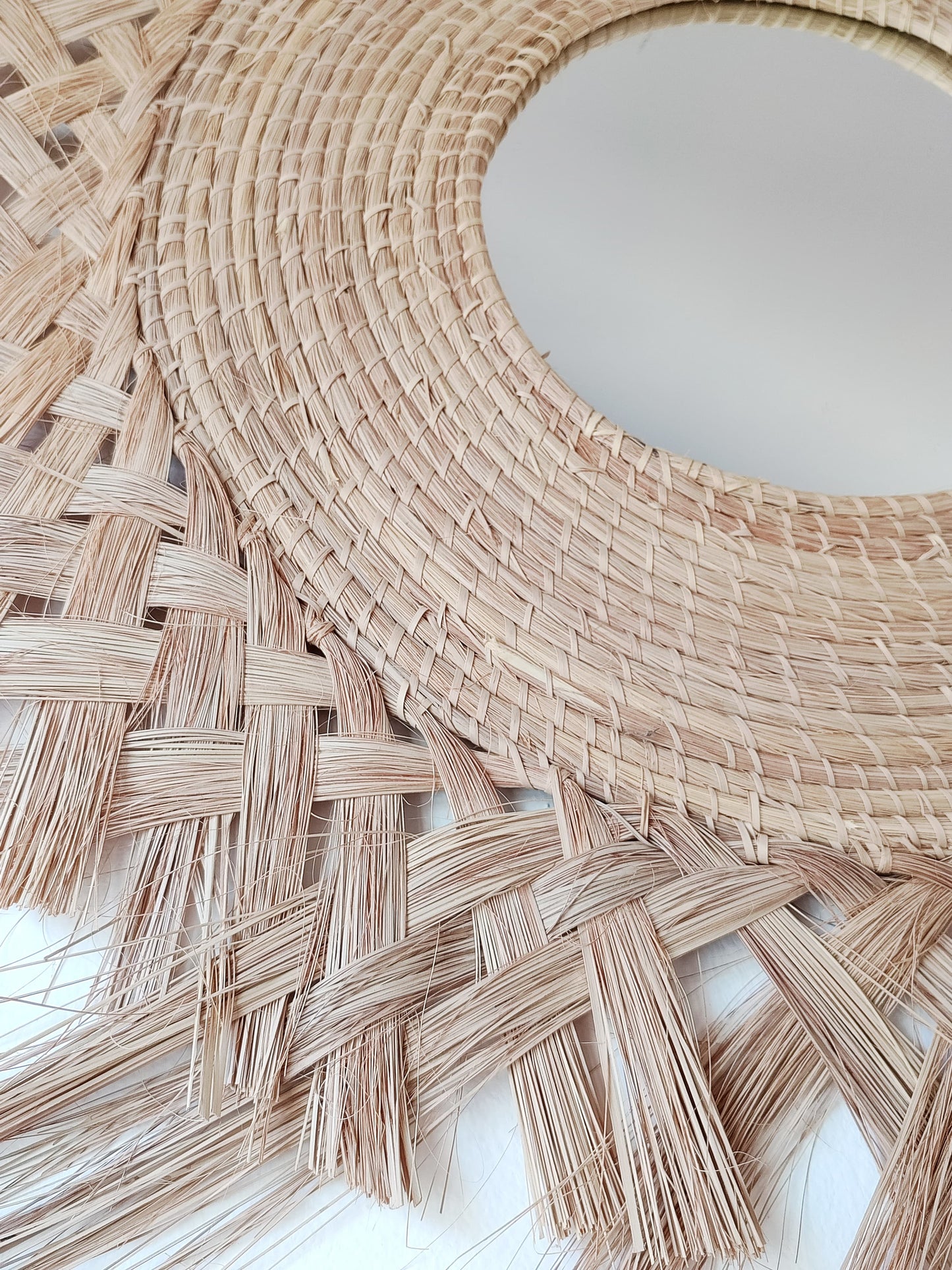 Espejo flecos irregulares