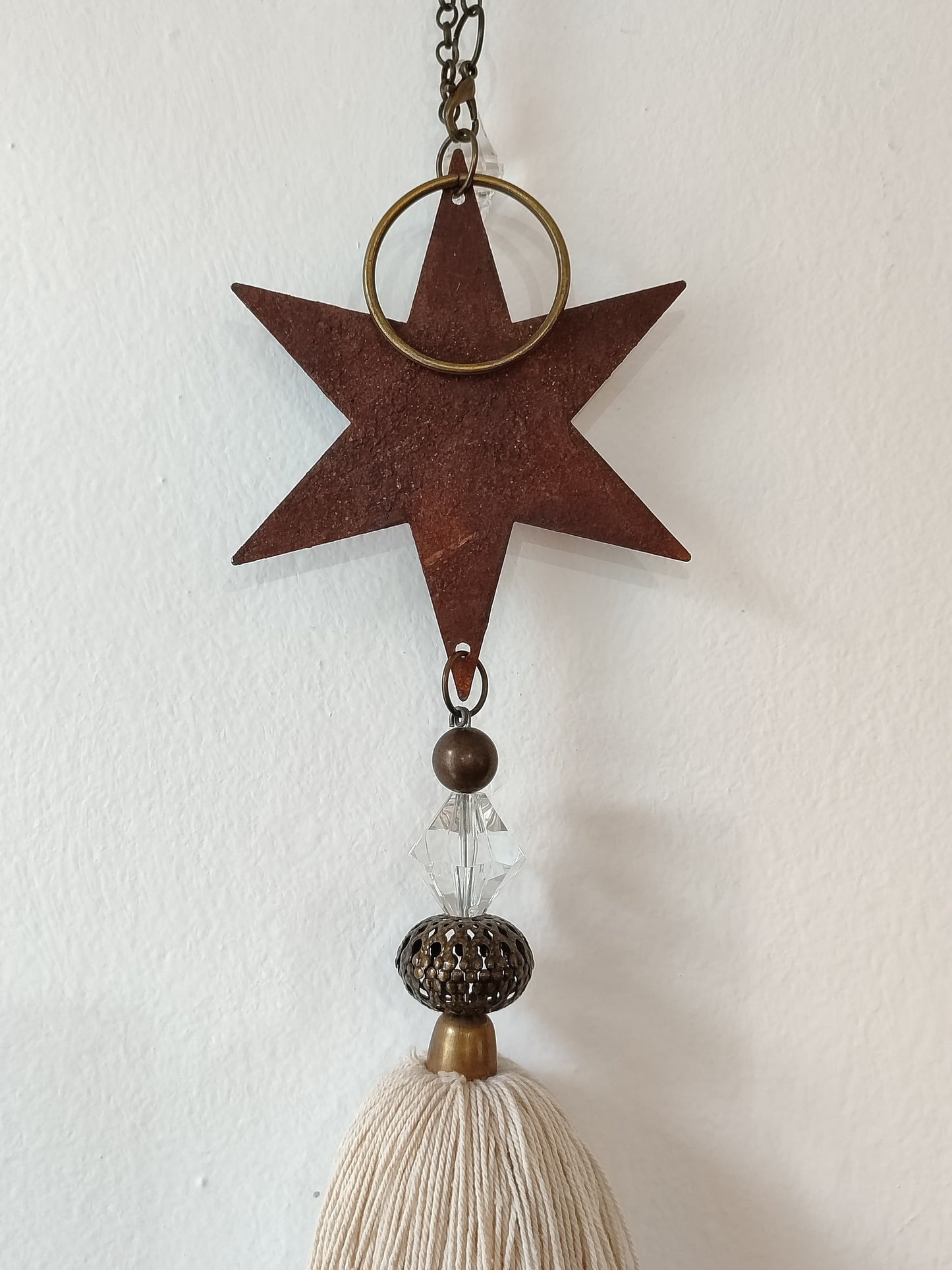 Sujeta cortina estrella