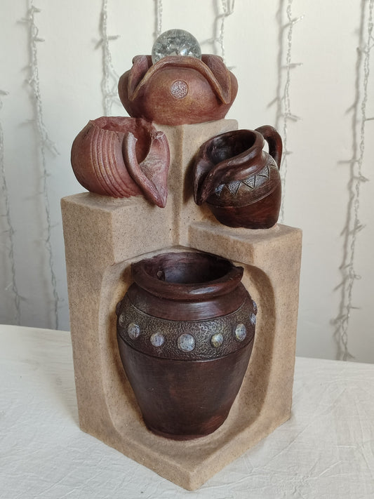 Fuente de agua jarrones